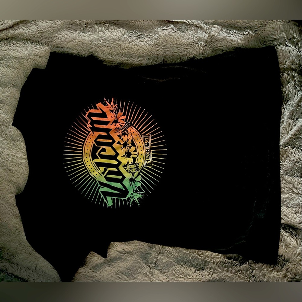 Black Small Volcom short sleeve tee. Great Condition. Colorful design on back.